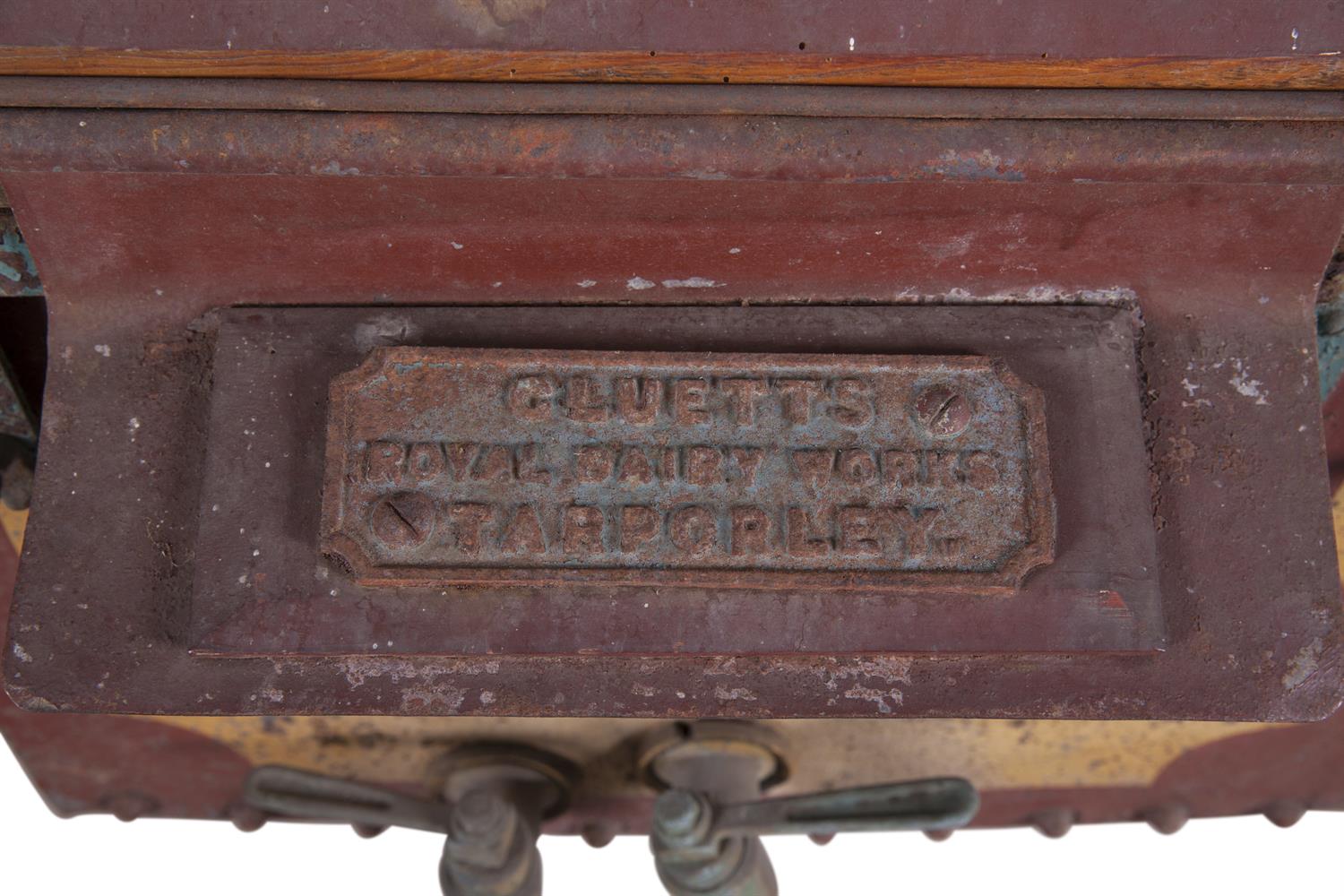 AN EDWARDIAN PAINTED METAL DAIRY CARRIAGE, on iron wheels, with plaque 'CLUETTS ROYAL DAIRY WORK - Image 2 of 2