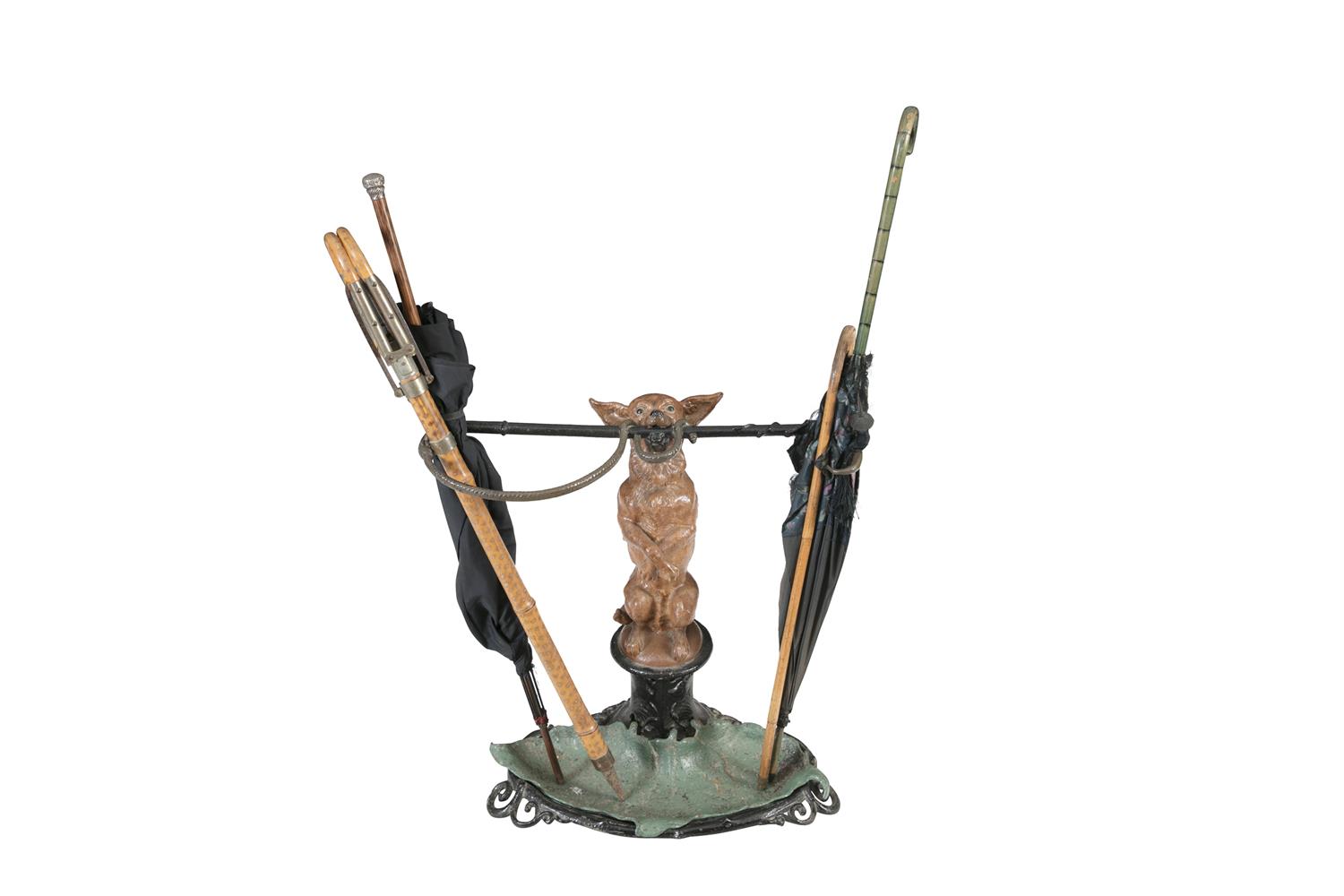 A 19TH CENTURY PAINTED CAST IRON UMBRELLA STAND AFTER COLBROOKDALE, moulded as a chihuahua dog