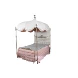 A BRASS FOUR POST CANOPY BED, C.1900, PROBABLY FRENCH, the brass domed canopy with finial hung