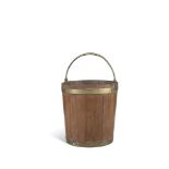 AN IRISH MAHOGANY BRASS BOUND BUCKET, early 19th Century, with swing handle. 40cm highProvenance: