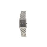 A LADY'S STAINLESS STEEL WATCH BY RAYMOND WEIL, the rectangular shaped grey dial with roman numerals