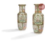 CHINE, Canton - XIXe siècle Paire de vases rouleau en porcelaine émaillée polychrome à décor de