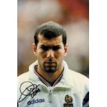 Autograph Football World Champion. Zidane - Coloured photo with original signature of French World