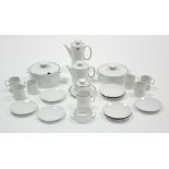 A Thomas (German) white glazed porcelain nineteen-piece part coffee service, & two ditto circular