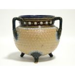 A Royal Doulton stoneware cauldron-shaped vase with short angular handles to the neck, & on three