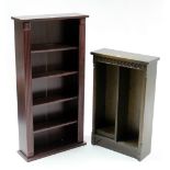 A small oak standing open bookcase with four adjustable shelves, & on plinth base, 21” wide x 33½”