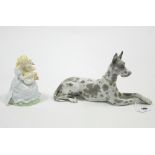 A Lladro ornament in the form of a recumbent Great Dane, 12” long; & a Coalport bone china figure “