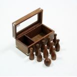 A modern hardwood table skittles game, with case.