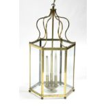 A reproduction brass frame hexagonal hall lantern; 30” high.