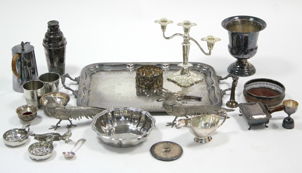 A silver plated engraved rectangular two-handled tea tray; a silver plated twin-branch table