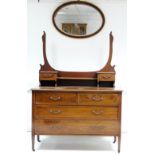 An Edwardian inlaid-mahogany dressing chest with matched oval swing mirror to the stage back, fitted