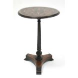 A Victorian rosewood pedestal table with slender turned & fluted column & triform base, the circular