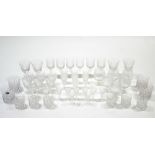 A part suite of cut-glassware comprising fifty items including six wines, six brandy balloons,