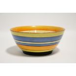 A Clarice Cliff “Fantasque” deep bowl painted with coloured horizontal bands to the exterior, 8½”