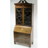 A LATE 19th/EARLY 20th CENTURY INLAID-MAHOGANY BUREAU BOOKCASE, the upper part with three adjustable