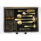 A service of gold plated flatware & cutlery by Bestecke of Solingen, twelve place settings & various