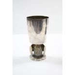 A Stuart Devlin "Bristol 600" goblet with plain tapered bowl on short textured stem with five