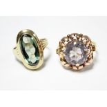 An Austrian gold (585) ring set narrow oval tourmaline; & a similar ring set large circular pale