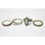 An eternity ring set small green & white stones; another ring set small rubies (both with stones