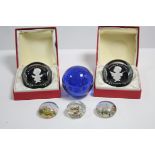 Two Baccarat "Elizabeth II, 1977" Limited Edition coloured glass paperweights (Ltd. Edn. Nos. 215/