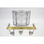 A silvered-metal frame three fold spark guard, 28” high; together with a brass fender; & a set of