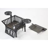 A South African black finish cast-iron small fire grate, 11¾" wide x 12¼" high.