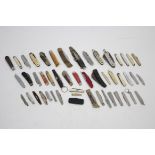 Forty-eight various penknives.