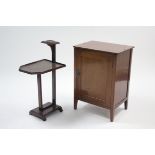 A mahogany bedside cabinet fitted shelf enclosed by panel door & on short square tapered legs,