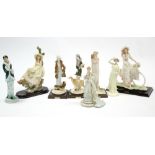 Eight various female figure ornaments, un-boxed; nine various shoe & handbag ornaments; & three