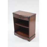 An inlaid mahogany small bow-front bookcase fitted frieze drawer above an adjustable shelf, & on