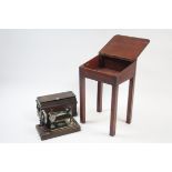 A singer hand sewing machine with oak case; & a small child's desk, 17¾" wide.