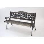 A modern teak & cast iron garden bench, 49½” long.