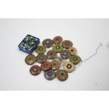 Seventeen various wooden yo-yos; & a collection of china & glass marbles.