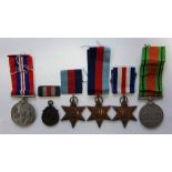 A group of five World War Two medals, un-named as issued; 1939-45 Star (2), France & Germany Star,