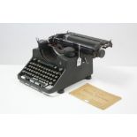 A Bar-Lock “No. 22” typewriter with instruction booklet.