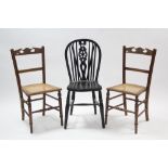 A wheel-back kitchen chair with hard seat & on turned legs with spindle stretchers; & a pair of late