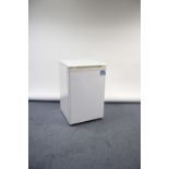 A Beko under-counter refrigerator in white-finish case, w.o.