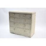 A Victorian cream painted pine chest fitted two short & three long graduated drawers with turned