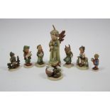 Two Goebel Hummel figures titled: “Little Goat Herder” & “The Lost Sheep”; together with six various