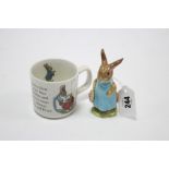 A Beswick Beatrix Potter character figure “Mrs Flopsy Bunny”; & a Wedgwood of Etruria “Peter Rabbit”