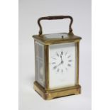 A FRENCH BRASS CARRIAGE CLOCK by RICHARD & Co., with repeater movement & striking quarters on two