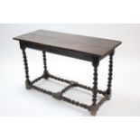 A late 17th century small centre table with rectangular two-board top on four barley-twist legs with