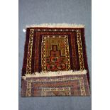 A Persian prayer rug with nine scattered guhls to the centre, 49" x 33"; & another rug of fawn