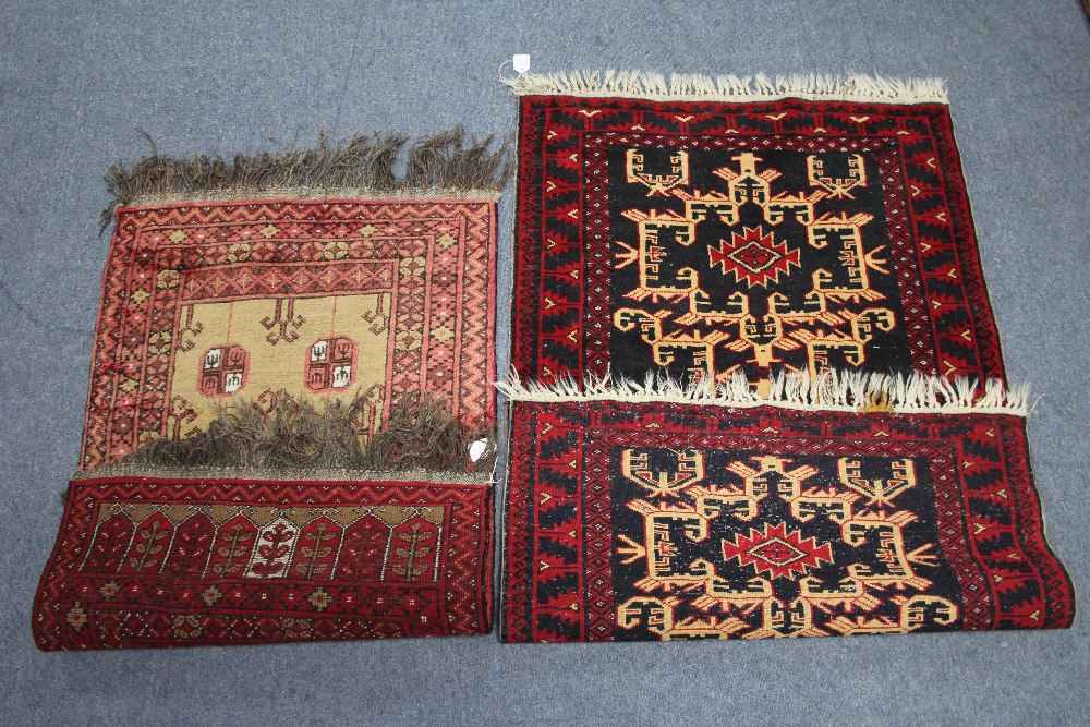 A Persian rug of dark blue ground, with cream hook pattern within crimson border, 60" x 35"; & a - Image 2 of 2