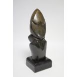 A contemporary Zimbabwean green hardstone sculpture of an abstract form, by Elijah Kateahe; 14"