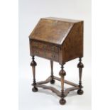 A William & Mary style burr-walnut veneered small bureau with crossbanding & herringbone inlay