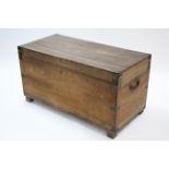 A 19th century camphor-wood large trunk with lift lid, & brass-mounted corners & side handles; 45"