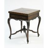 A late Victorian mahogany envelope-top card table fitted frieze drawer with blind-fret front, on