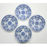 Four early 19th century Spode blue transfer soup plates decorated with Chinese artefacts; 9½".