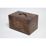 A late 18th century figured mahogany & crossbanded rectangular tea caddy, the hinged lid & front